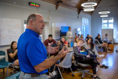 Man speaking to students 