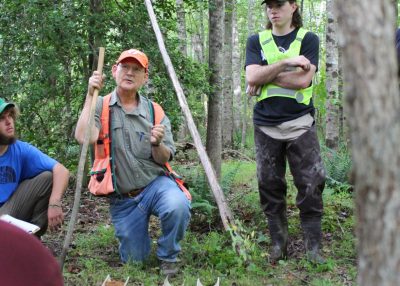 The forest was the world's best lab for Professor Mike Aust (center). In his 35 years at Virginia Tech, he took thousands of forestry students into the woodlands to see the forest up close. 
