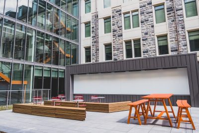 Exterior photo of the completed CID residence hall