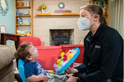 Bella in occupational therapy with Dory Wallace